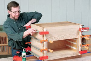 Clamping and gluing chestnut tool chest